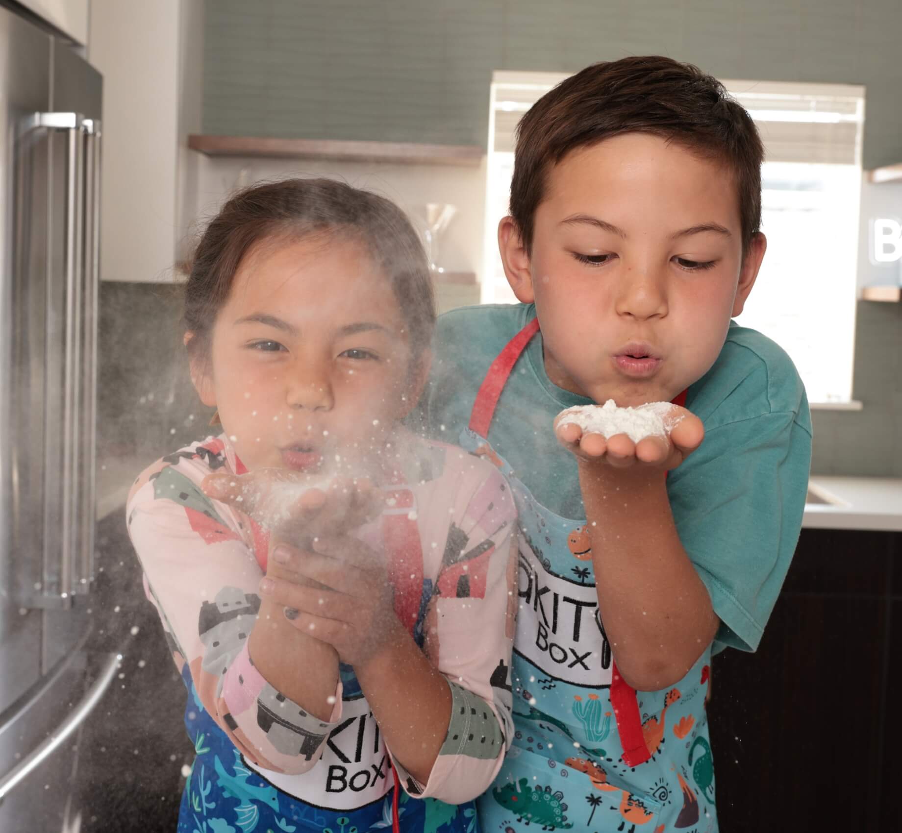 kids playing with baking ingredients